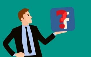 Image of male character holding Facebook logo with question mark about Should I Use Facebook Page for Business Marketing